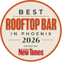 A circular award badge reading “Best Rooftop Bar in Phoenix 2026,” provided by New Times.